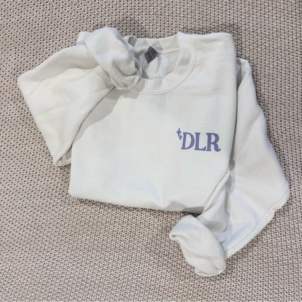 Adorable DLR Sweatshirt with Walt quote on back perfect for Disney Parks